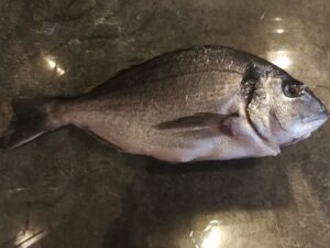 Filetti di orata con fagiolini sabbiosi